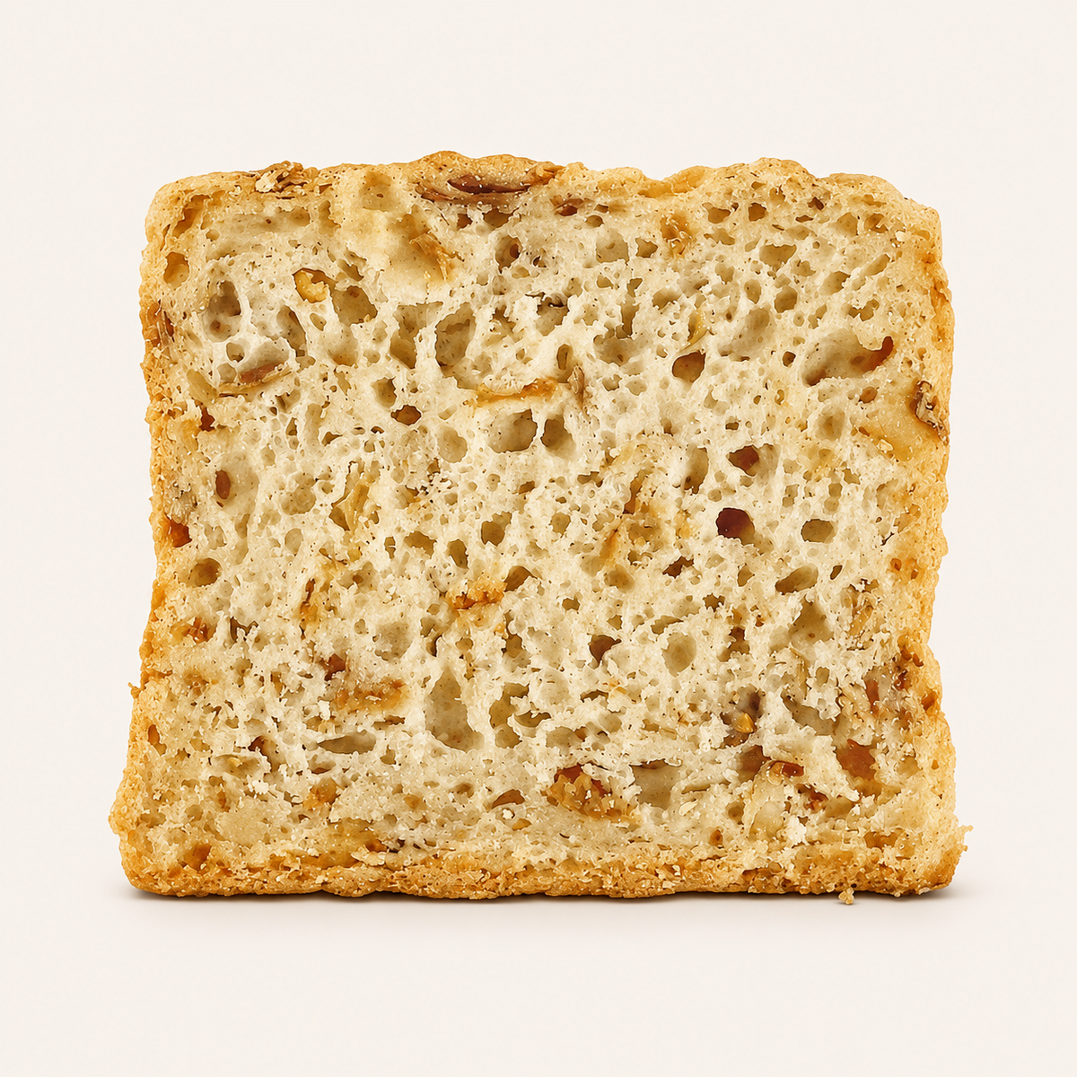 Fatia do Pão Aveia & Maçã Honesto sem glúten mostrando a textura