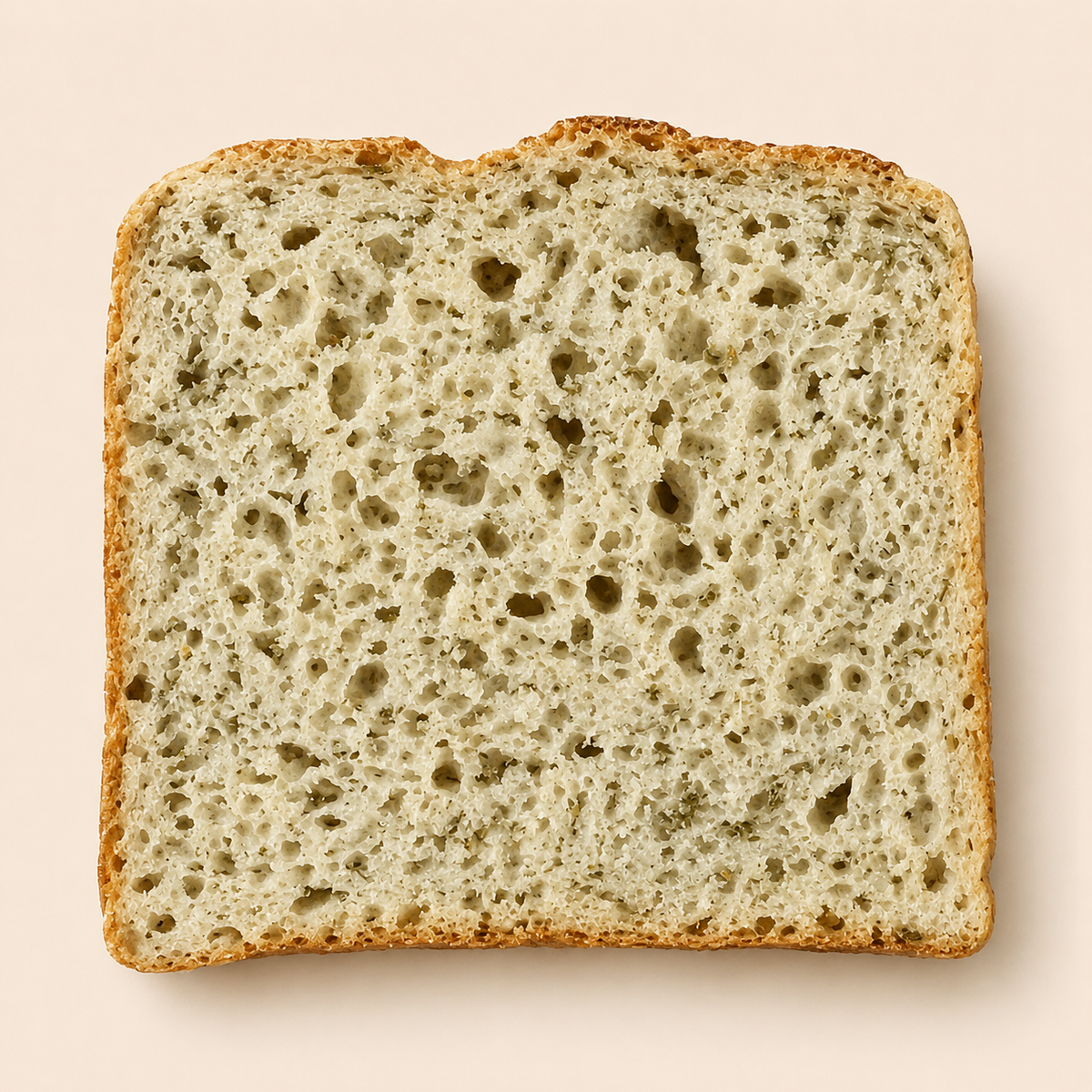 Fatia do Pão Italiano Honesto sem glúten mostrando a textura e as ervas